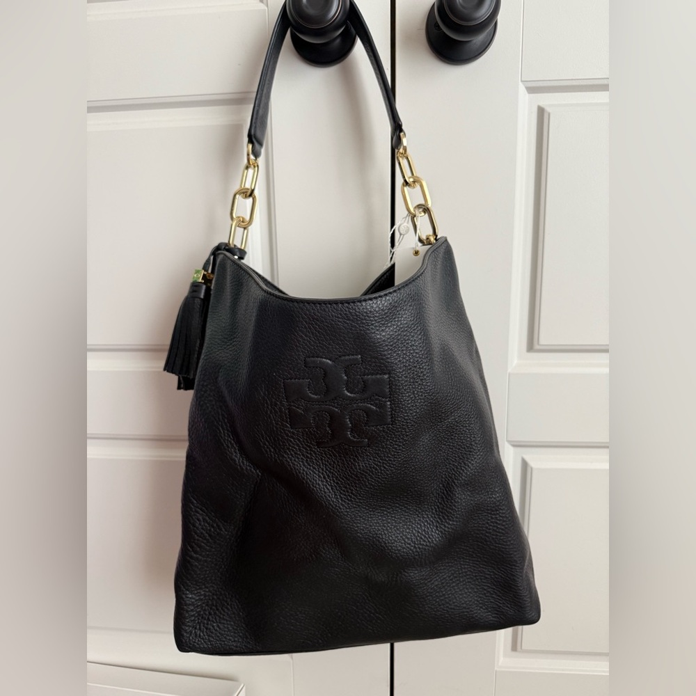 Tory Burch Hobo Tassel bag and matching wallet in black. Like new!